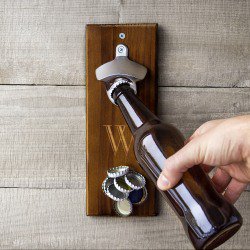 Wall mount opener with magnetic cap catcher